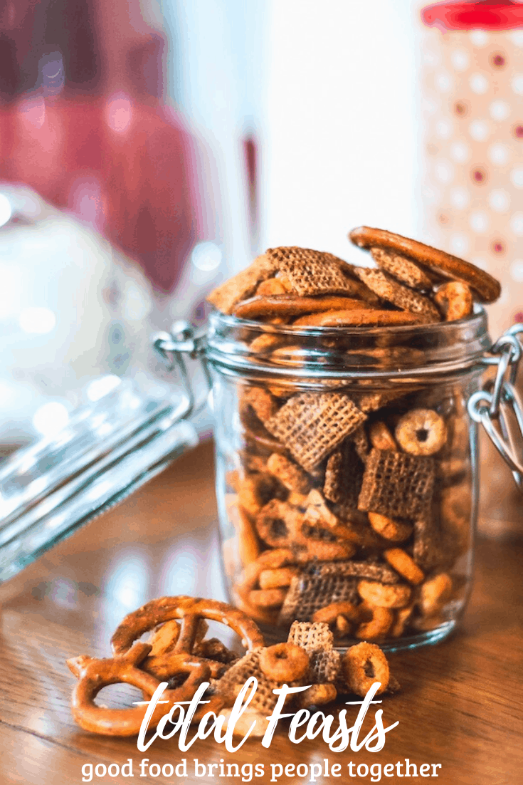 Maple sriracha snack mix in a glass jar - side shot