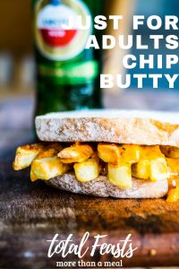 Just for adults chip butty, a spicy twist on a British classic. With hot french fries and a spicy sauce, it is a perfect naughty treat for a cold day.