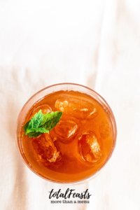 ice tea in glass with ice and mint