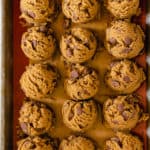 chocolate chip cookie dough scoops on baking sheet